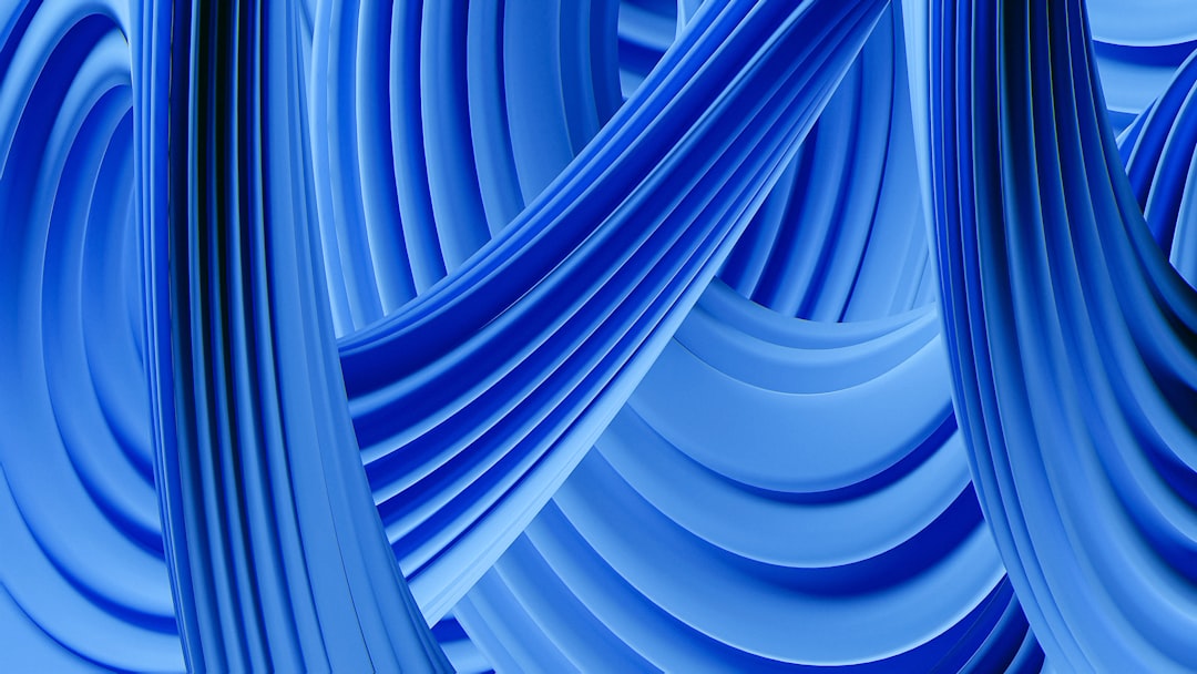 a-blue-abstract-background-with-curved-lines-jlwp4enftai