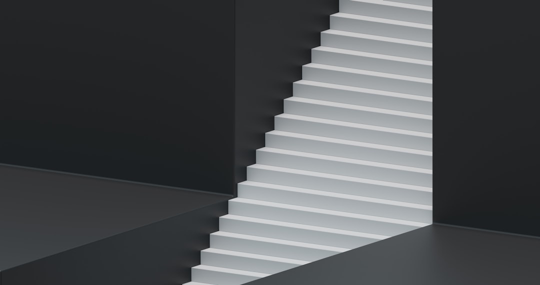 a-white-staircase-in-a-black-room-odfzti3q87o